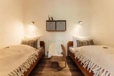 Ein Bett oder Betten in einem Zimmer der Unterkunft Harzglanz FeWo's HARZbock
