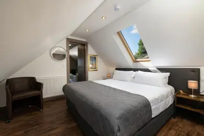 Ein Bett oder Betten in einem Zimmer der Unterkunft Angelo Spa Resort