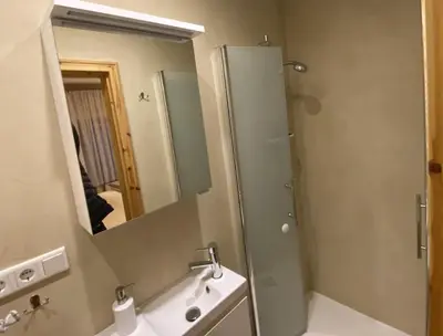 Ein Badezimmer in der Unterkunft Haus Sabine - Zimmer 4