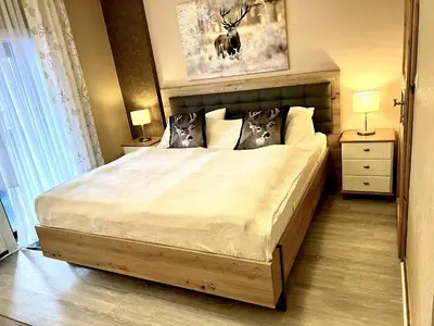 Ein Bett oder Betten in einem Zimmer der Unterkunft Haus Sabine - Zimmer 4