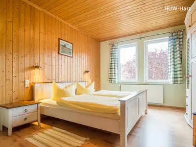 Ein Bett oder Betten in einem Zimmer der Unterkunft Ferienwohnung An der Malzmühle