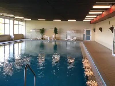 Der Swimmingpool an oder in der Nähe von Ferienwohnung Harz #3, Pool, Sauna, WLAN