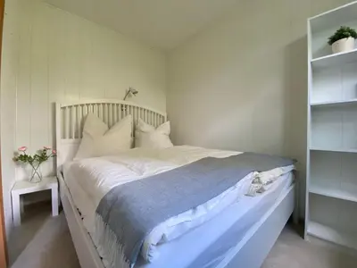 Ein Bett oder Betten in einem Zimmer der Unterkunft Ferienwohnung Harz #3, Pool, Sauna, WLAN