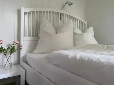 Ein Bett oder Betten in einem Zimmer der Unterkunft Ferienwohnung Harz #3, Pool, Sauna, WLAN