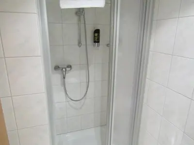 Ein Badezimmer in der Unterkunft Pension Hexenkessel