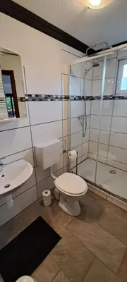 Ein Badezimmer in der Unterkunft Quellenhof Altenau