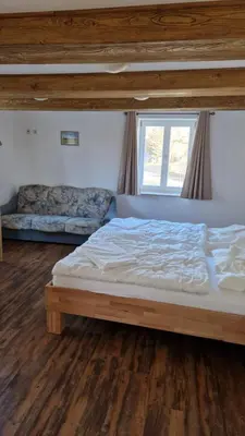 Ein Bett oder Betten in einem Zimmer der Unterkunft Ferienwohnung Demmel & Cie