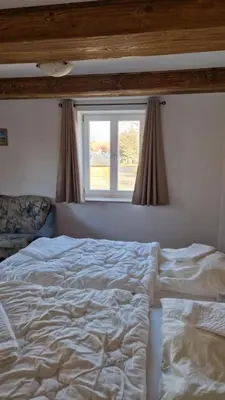 Ein Bett oder Betten in einem Zimmer der Unterkunft Ferienwohnung Demmel & Cie