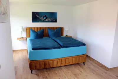 Ein Bett oder Betten in einem Zimmer der Unterkunft Harzhaus Sonnenschein