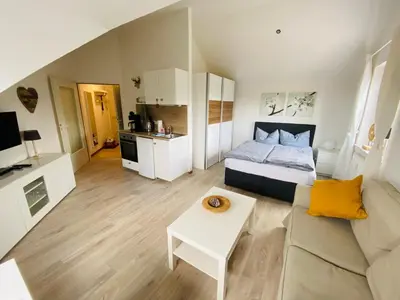 Ein Bett oder Betten in einem Zimmer der Unterkunft Harztraum-17