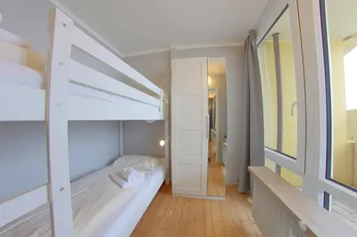 Ein Bett oder Betten in einem Zimmer der Unterkunft Apartment 560