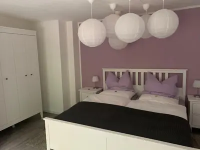 Ein Bett oder Betten in einem Zimmer der Unterkunft Ferienwohnung an der Oker