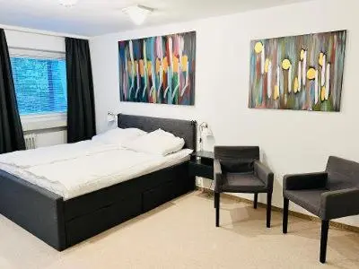 Ein Bett oder Betten in einem Zimmer der Unterkunft Residenz Goslarsche Straße