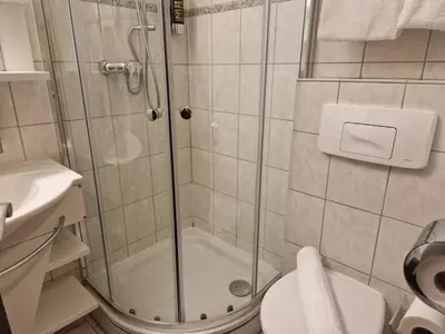 Ein Badezimmer in der Unterkunft Hotel Paidion