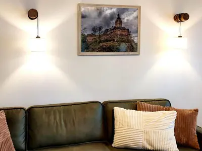 Ein Sitzbereich in der Unterkunft Ferienhaus Blaue Blume mit 11 kW Ladestation, Kamin, Terrasse, eingezäuntem Garten, Sauna, WLAN, Netflix, 2 Hunde willkommen!