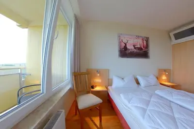 Ein Bett oder Betten in einem Zimmer der Unterkunft Apartment 535