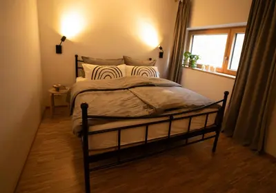 Ein Bett oder Betten in einem Zimmer der Unterkunft An der Kirchtreppe