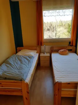 Ein Bett oder Betten in einem Zimmer der Unterkunft Utuwe