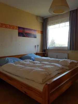 Ein Bett oder Betten in einem Zimmer der Unterkunft Utuwe