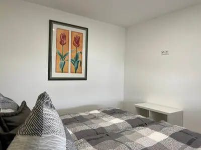 Ein Bett oder Betten in einem Zimmer der Unterkunft Ellas Ferienhaus