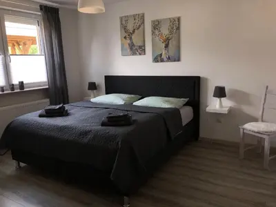 Ein Bett oder Betten in einem Zimmer der Unterkunft Ferienwohnung „kleine Auszeit“