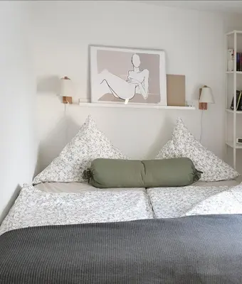 Ein Bett oder Betten in einem Zimmer der Unterkunft Ferienwohnung Heusler