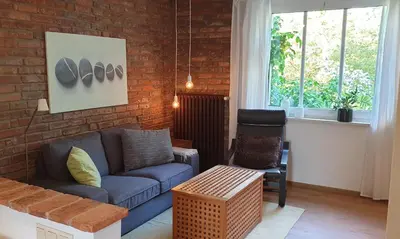 Ein Sitzbereich in der Unterkunft Ferienwohnung Heusler