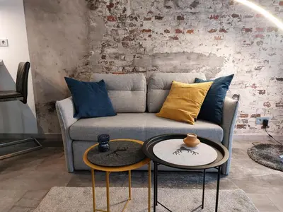 Ein Sitzbereich in der Unterkunft Ferienwohnung Domicile chic mit Schwimmbad und Saunanutzung