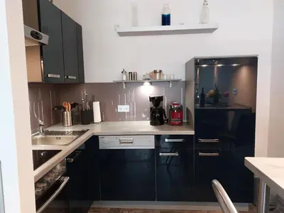 Küche/Küchenzeile in der Unterkunft Ferienwohnung Domicile chic mit Schwimmbad und Saunanutzung