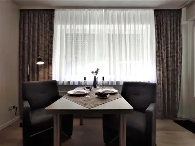 Ein Sitzbereich in der Unterkunft Ferienwohnung Magdalena
