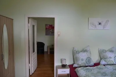 Ein Bett oder Betten in einem Zimmer der Unterkunft Villa Brockenstürmer