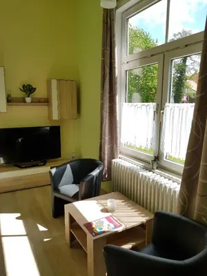 Ein Sitzbereich in der Unterkunft Villa Brockenstürmer