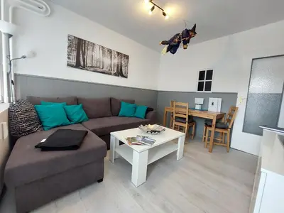 Ein Sitzbereich in der Unterkunft Ferienwohnung Hexennest