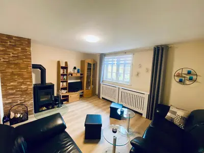 Ein Sitzbereich in der Unterkunft Ferienwohnung SILBERBACH im HAUS Gerlach