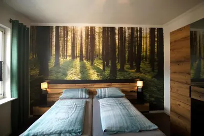 Ein Bett oder Betten in einem Zimmer der Unterkunft Ferienwohnung Busch 1