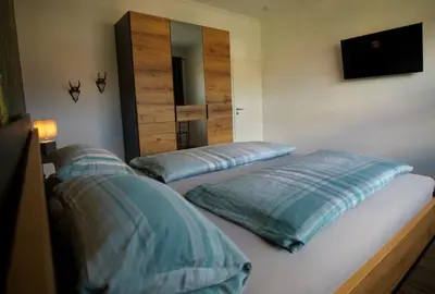 Ein Bett oder Betten in einem Zimmer der Unterkunft Ferienwohnung Busch 1