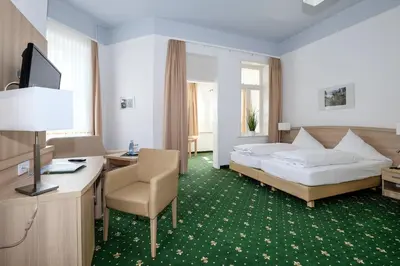 Ein Bett oder Betten in einem Zimmer der Unterkunft Hotel Brockenscheideck