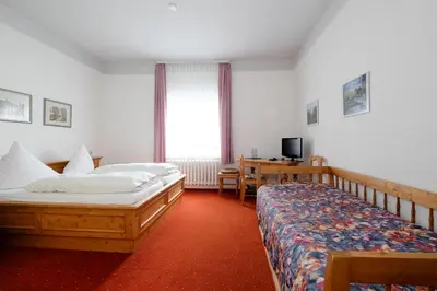 Ein Bett oder Betten in einem Zimmer der Unterkunft Hotel Brockenscheideck