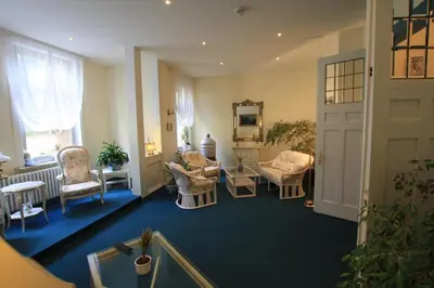Ein Sitzbereich in der Unterkunft Pension Villa Kassandra