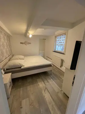 Ein Bett oder Betten in einem Zimmer der Unterkunft Apartment A6 Goslar am Marktplatz