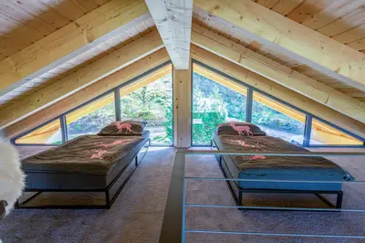 Ein Bett oder Betten in einem Zimmer der Unterkunft Panorama-Chalet im Harz