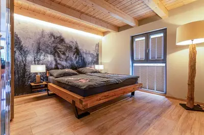Ein Bett oder Betten in einem Zimmer der Unterkunft Panorama-Chalet im Harz
