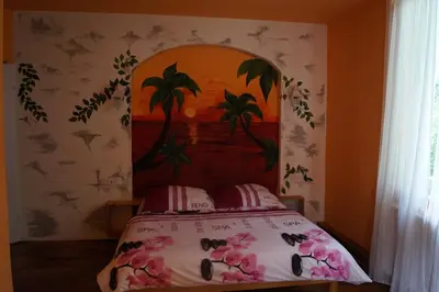 Ein Bett oder Betten in einem Zimmer der Unterkunft Pension Mona Lisa