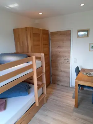 Ein Bett oder Betten in einem Zimmer der Unterkunft Dahls Ferienwohnung