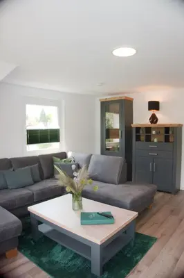 Ein Sitzbereich in der Unterkunft Ferienwohnung Busch 3