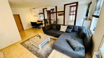 Ein Sitzbereich in der Unterkunft FeWo gemütliche Residenz mit Holzofen-Sauna von Harztraveler