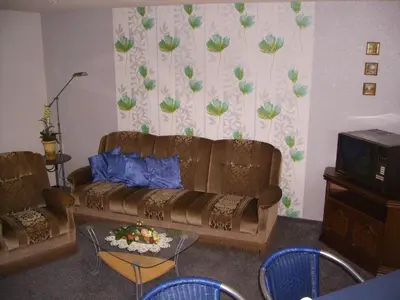 Ein Sitzbereich in der Unterkunft Ferienwohnung Fröhlich