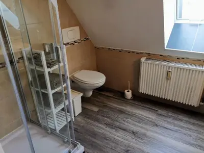 Ein Badezimmer in der Unterkunft Schöne Ferienwohnung für 6 Personen erwartet Sie im Oberharz