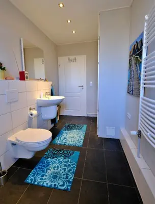 Ein Badezimmer in der Unterkunft An den Weiden