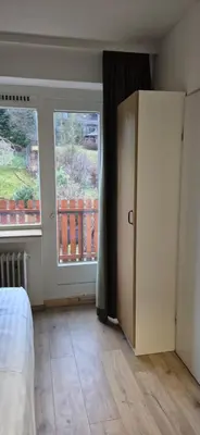 Ein Bett oder Betten in einem Zimmer der Unterkunft Orchidee Altenau